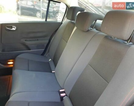 Красный Рено Меган, объемом двигателя 1.6 л и пробегом 167 тыс. км за 5900 $, фото 67 на Automoto.ua