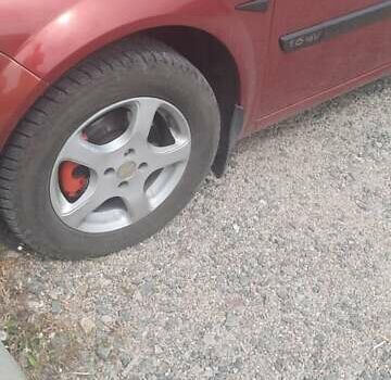 Рено Меган 2004 в Первомайск на Automoto.ua Красный Рено Меган, объемом двигателя 1.6 л и пробегом 257 тыс. км за 4750 $, фото 16 на Automoto.ua