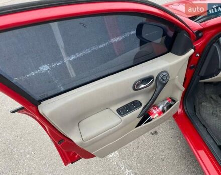 Красный Рено Меган, объемом двигателя 1.6 л и пробегом 265 тыс. км за 5200 $, фото 8 на Automoto.ua