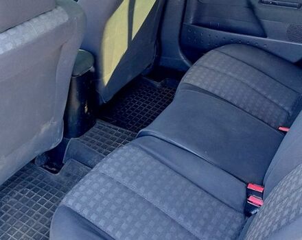 Красный Рено Меган, объемом двигателя 1.6 л и пробегом 290 тыс. км за 5100 $, фото 4 на Automoto.ua