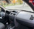 Рено Меган 2009 в Хмельницком на Automoto.ua Красный Рено Меган, объемом двигателя 1.6 л и пробегом 157 тыс. км за 5800 $, фото 34 на Automoto.ua