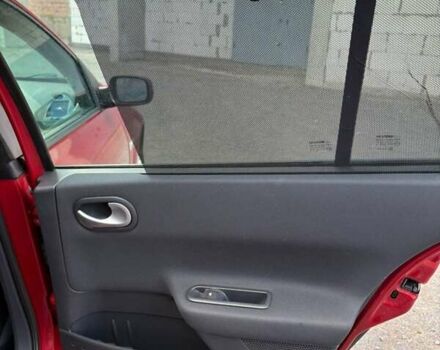 Рено Меган 2009 в Хмельницком на Automoto.ua Красный Рено Меган, объемом двигателя 1.6 л и пробегом 157 тыс. км за 5800 $, фото 39 на Automoto.ua