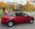 Рено Меган 2009 в Хмельницком на Automoto.ua Красный Рено Меган, объемом двигателя 1.6 л и пробегом 157 тыс. км за 5800 $, фото 4 на Automoto.ua