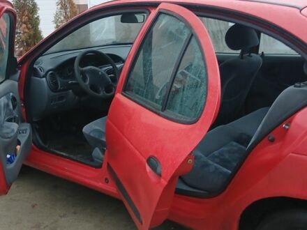 Красный Рено Меган, объемом двигателя 1.6 л и пробегом 300 тыс. км за 1400 $, фото 1 на Automoto.ua