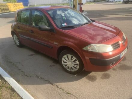 Рено Меган 2003 в Житомире на Automoto.ua Красный Рено Меган, объемом двигателя 1.6 л и пробегом 234 тыс. км за 3200 $, фото 1 на Automoto.ua
