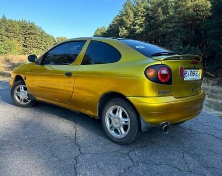 Жовтий Рено Меган, об'ємом двигуна 2 л та пробігом 235 тис. км за 2800 $, фото 2 на Automoto.ua