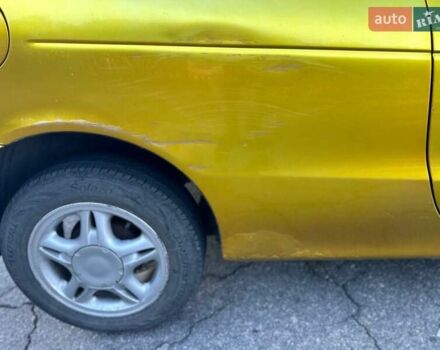 Жовтий Рено Меган, об'ємом двигуна 2 л та пробігом 235 тис. км за 2800 $, фото 10 на Automoto.ua