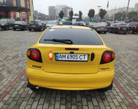Жовтий Рено Меган, об'ємом двигуна 2 л та пробігом 210 тис. км за 2000 $, фото 5 на Automoto.ua