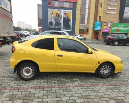 Жовтий Рено Меган, об'ємом двигуна 2 л та пробігом 210 тис. км за 2000 $, фото 3 на Automoto.ua