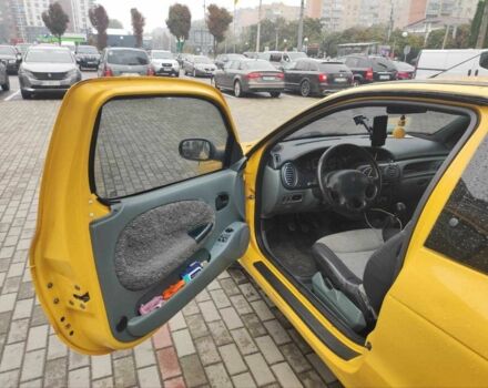 Жовтий Рено Меган, об'ємом двигуна 2 л та пробігом 210 тис. км за 2000 $, фото 12 на Automoto.ua