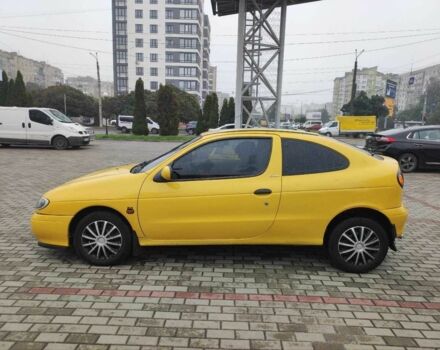 Жовтий Рено Меган, об'ємом двигуна 2 л та пробігом 210 тис. км за 2000 $, фото 4 на Automoto.ua