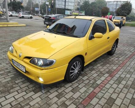 Жовтий Рено Меган, об'ємом двигуна 2 л та пробігом 210 тис. км за 2000 $, фото 1 на Automoto.ua