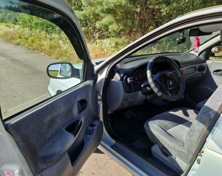 Сірий Рено Меган, об'ємом двигуна 1.6 л та пробігом 226 тис. км за 2000 $, фото 3 на Automoto.ua