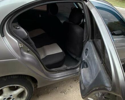Сірий Рено Меган, об'ємом двигуна 1.6 л та пробігом 400 тис. км за 2700 $, фото 2 на Automoto.ua