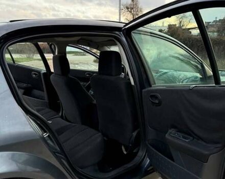 Серый Рено Меган, объемом двигателя 1.6 л и пробегом 217 тыс. км за 4500 $, фото 12 на Automoto.ua