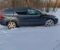 Серый Рено Меган, объемом двигателя 1.6 л и пробегом 217 тыс. км за 3900 $, фото 1 на Automoto.ua