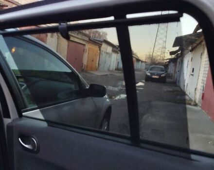 Серый Рено Меган, объемом двигателя 2 л и пробегом 162 тыс. км за 6299 $, фото 125 на Automoto.ua