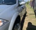 Рено Меган 2007 у Бару на Automoto.ua Сірий Рено Меган, об'ємом двигуна 1.6 л та пробігом 215 тис. км за 4999 $, фото 12 на Automoto.ua