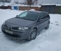 Сірий Рено Меган, об'ємом двигуна 1.5 л та пробігом 209 тис. км за 6800 $, фото 1 на Automoto.ua