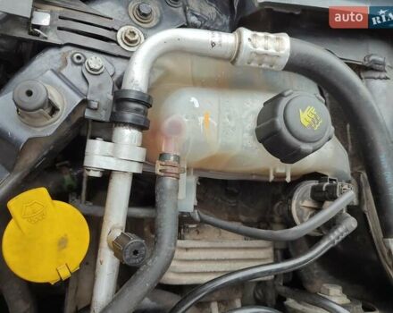 Серый Рено Меган, объемом двигателя 1.4 л и пробегом 250 тыс. км за 7500 $, фото 98 на Automoto.ua