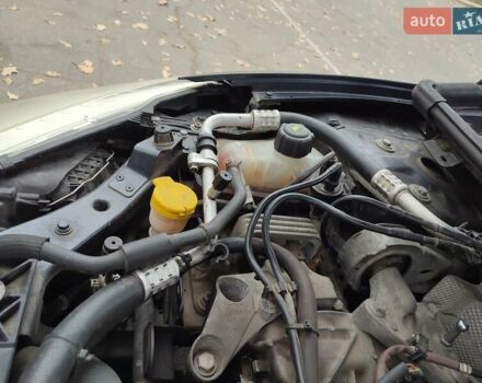 Серый Рено Меган, объемом двигателя 1.4 л и пробегом 250 тыс. км за 7500 $, фото 116 на Automoto.ua