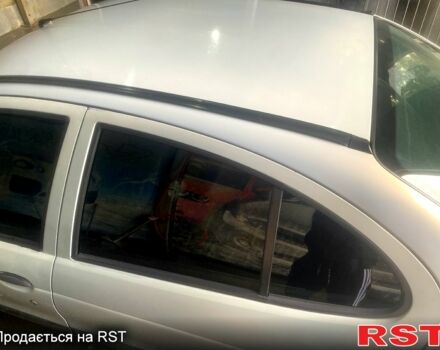 Серый Рено Меган, объемом двигателя 1.4 л и пробегом 215 тыс. км за 2500 $, фото 1 на Automoto.ua