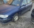 Синий Рено Меган, объемом двигателя 1.4 л и пробегом 406 тыс. км за 550 $, фото 4 на Automoto.ua