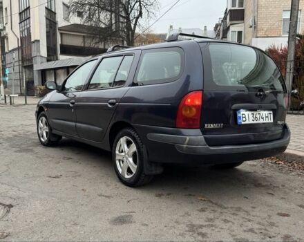 Синий Рено Меган, объемом двигателя 1.6 л и пробегом 310 тыс. км за 3100 $, фото 4 на Automoto.ua