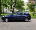 Синий Рено Меган, объемом двигателя 1.6 л и пробегом 260 тыс. км за 3950 $, фото 1 на Automoto.ua
