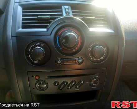 Синий Рено Меган, объемом двигателя 1.6 л и пробегом 212 тыс. км за 5600 $, фото 3 на Automoto.ua