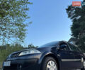 Синий Рено Меган, объемом двигателя 1.6 л и пробегом 245 тыс. км за 4299 $, фото 2 на Automoto.ua