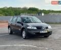 Синий Рено Меган, объемом двигателя 1.6 л и пробегом 135 тыс. км за 6350 $, фото 6 на Automoto.ua