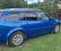 Синій Рено Меган, об'ємом двигуна 1.6 л та пробігом 240 тис. км за 4695 $, фото 1 на Automoto.ua