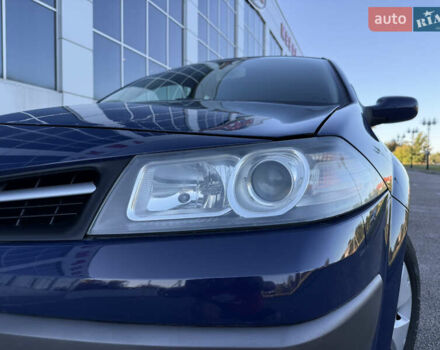 Рено Меган 2009 у Белой Церкве на Automoto.ua Синій Рено Меган, об'ємом двигуна 1.6 л та пробігом 202 тис. км за 5500 $, фото 67 на Automoto.ua