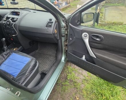 Зеленый Рено Меган, объемом двигателя 1.4 л и пробегом 203 тыс. км за 4199 $, фото 4 на Automoto.ua