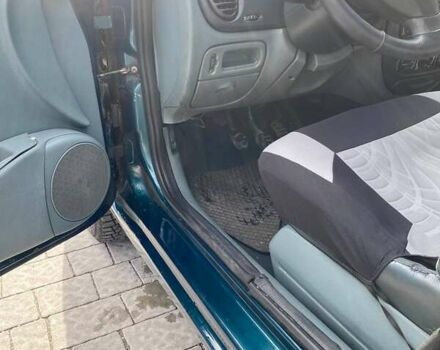 Зелений Рено Меган, об'ємом двигуна 1.4 л та пробігом 288 тис. км за 1750 $, фото 6 на Automoto.ua