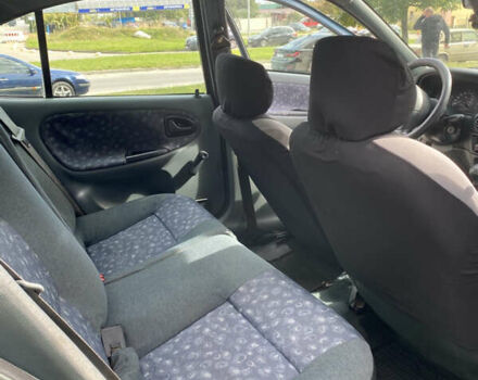 Зеленый Рено Меган, объемом двигателя 1.4 л и пробегом 290 тыс. км за 2000 $, фото 12 на Automoto.ua