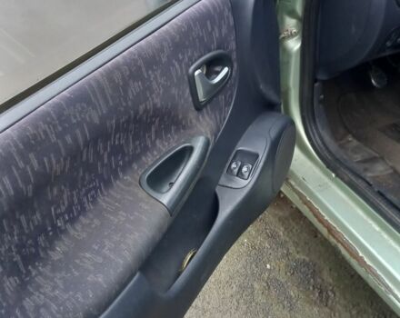 Зеленый Рено Меган, объемом двигателя 1.4 л и пробегом 1 тыс. км за 650 $, фото 5 на Automoto.ua