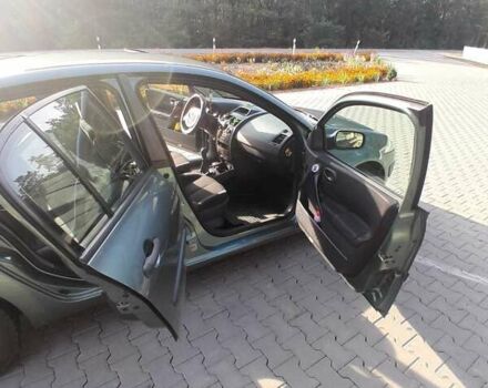 Зеленый Рено Меган, объемом двигателя 1.6 л и пробегом 281 тыс. км за 5200 $, фото 4 на Automoto.ua