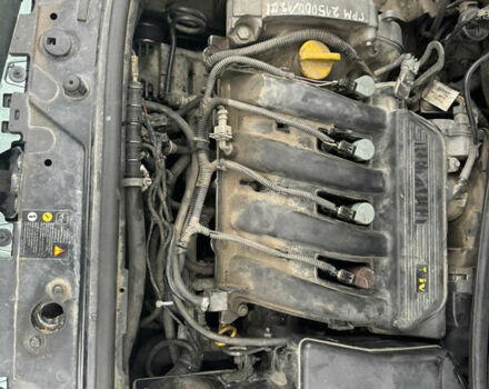 Зелений Рено Меган, об'ємом двигуна 1.4 л та пробігом 248 тис. км за 4000 $, фото 25 на Automoto.ua