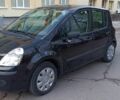 Черный Рено Модус, объемом двигателя 1.1 л и пробегом 188 тыс. км за 4300 $, фото 1 на Automoto.ua