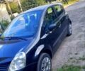 Черный Рено Модус, объемом двигателя 1.1 л и пробегом 195 тыс. км за 5100 $, фото 1 на Automoto.ua