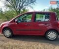 Красный Рено Модус, объемом двигателя 1.2 л и пробегом 200 тыс. км за 4900 $, фото 1 на Automoto.ua