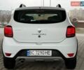 Белый Рено Сандеро СтэпВэй, объемом двигателя 1.46 л и пробегом 221 тыс. км за 7499 $, фото 12 на Automoto.ua