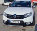 Білий Рено Сандеро СтепВей, об'ємом двигуна 0.9 л та пробігом 100 тис. км за 10000 $, фото 1 на Automoto.ua