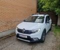 Белый Рено Сандеро СтэпВэй, объемом двигателя 0.9 л и пробегом 92 тыс. км за 10300 $, фото 1 на Automoto.ua