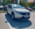 Белый Рено Сандеро СтэпВэй, объемом двигателя 0.9 л и пробегом 47 тыс. км за 10900 $, фото 1 на Automoto.ua