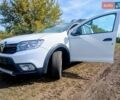Белый Рено Сандеро СтэпВэй, объемом двигателя 0.9 л и пробегом 117 тыс. км за 9999 $, фото 1 на Automoto.ua