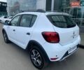 Білий Рено Сандеро СтепВей, об'ємом двигуна 0.9 л та пробігом 31 тис. км за 10573 $, фото 4 на Automoto.ua