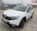 Белый Рено Сандеро СтэпВэй, объемом двигателя 0.9 л и пробегом 84 тыс. км за 9900 $, фото 1 на Automoto.ua